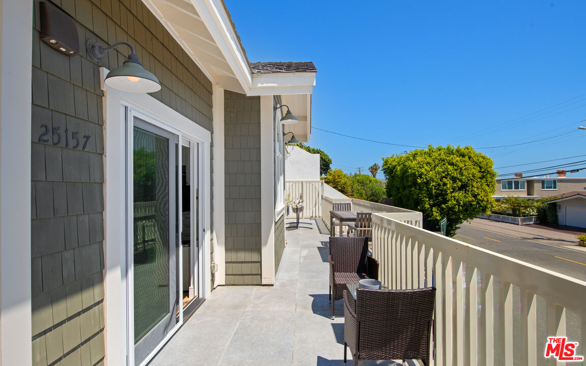 25157 Malibu Road Malibu, CA 90265 - Photo 29 of 33 a view of a balcony with chairs
