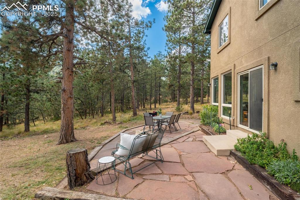 320 Hilton Road Manitou Springs, CO 80829 - Photo 33 of 44 a view of a patio with couple of chairs