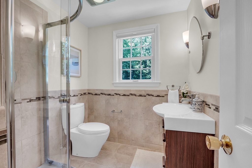9 Berry Lane Acton, MA 01720 - Photo 18 of 42 a bathroom with a toilet sink and shower