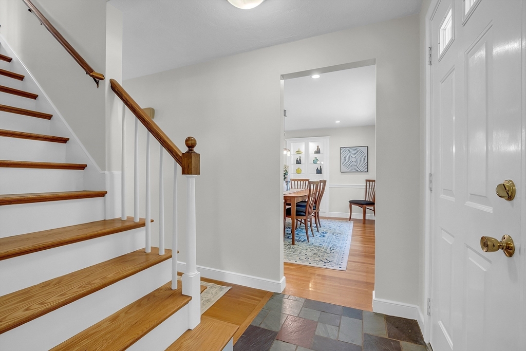 9 Berry Lane Acton, MA 01720 - Photo 21 of 42 a view of entryway with livingroom and furniture