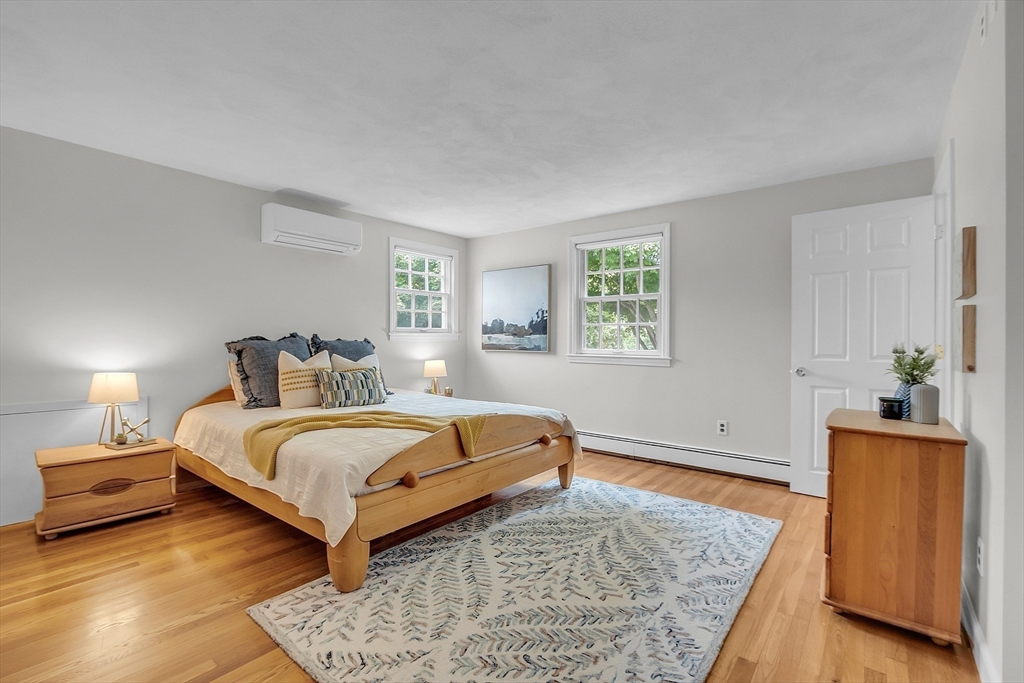 9 Berry Lane Acton, MA 01720 - Photo 22 of 42 a bedroom with a bed and a window