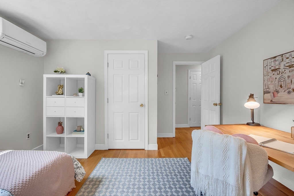 9 Berry Lane Acton, MA 01720 - Photo 26 of 42 a bedroom with a bed and a window