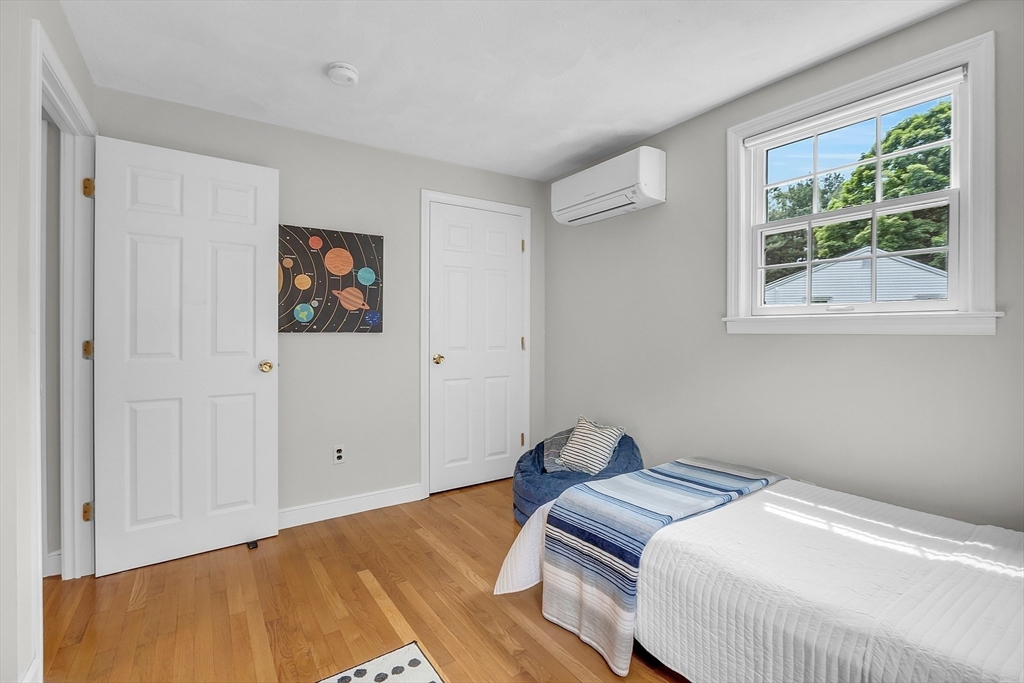 9 Berry Lane Acton, MA 01720 - Photo 28 of 42 a bedroom with bed and a window