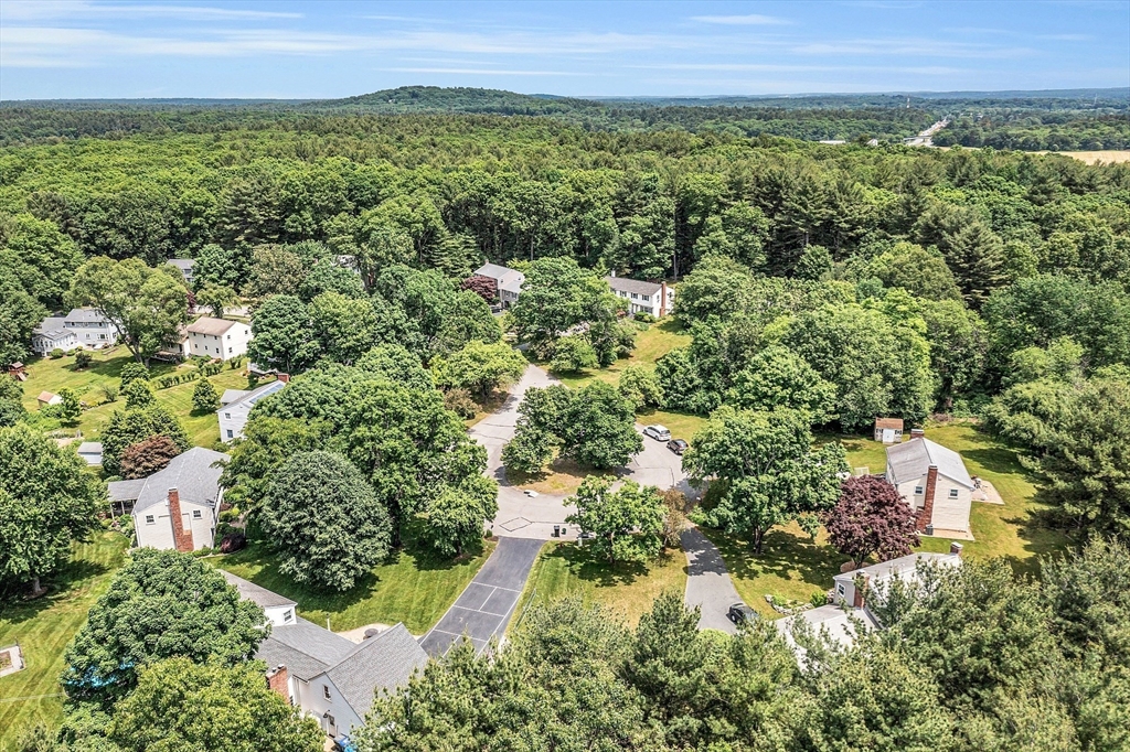 9 Berry Lane Acton, MA 01720 - Photo 38 of 42 an aerial view of a house with a yard