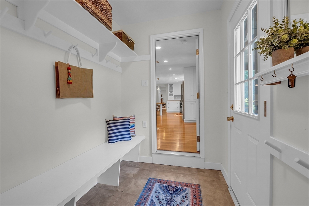 9 Berry Lane Acton, MA 01720 - Photo 10 of 42 a view of an empty room and outdoor space