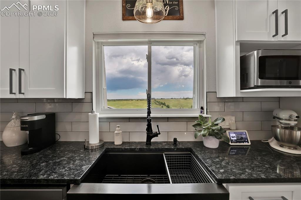 18135 Spur Ranch Road Peyton, CO 80831 - Photo 8 of 50 Views from every window in this home! Granite and modern finishes