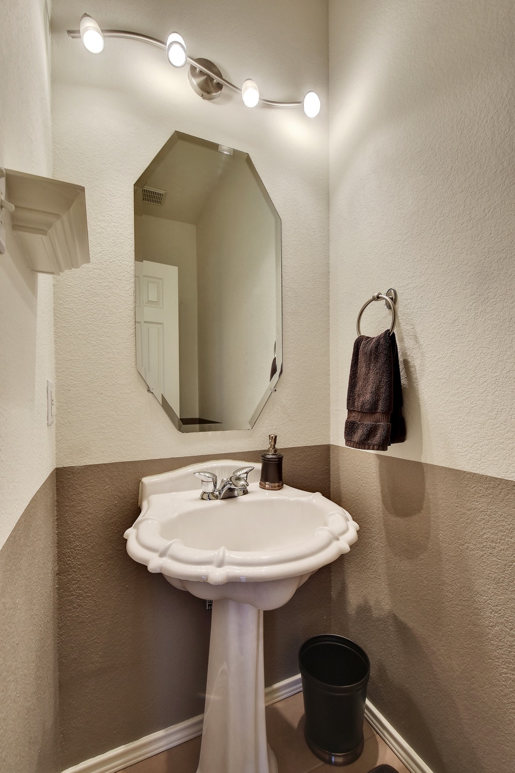 2201 Keepsake Drive Austin, TX 78745 - Photo 20 of 25 a bathroom with a sink and a mirror