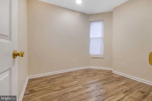 a view of a glass door and a window