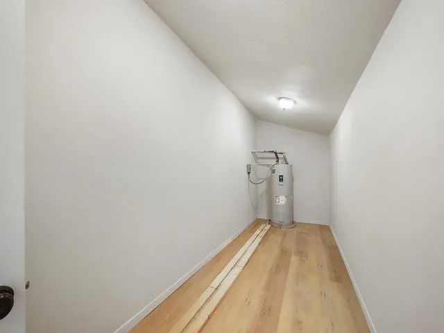 a view of a big room with wooden floor