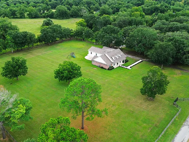 a view of a garden with a lake