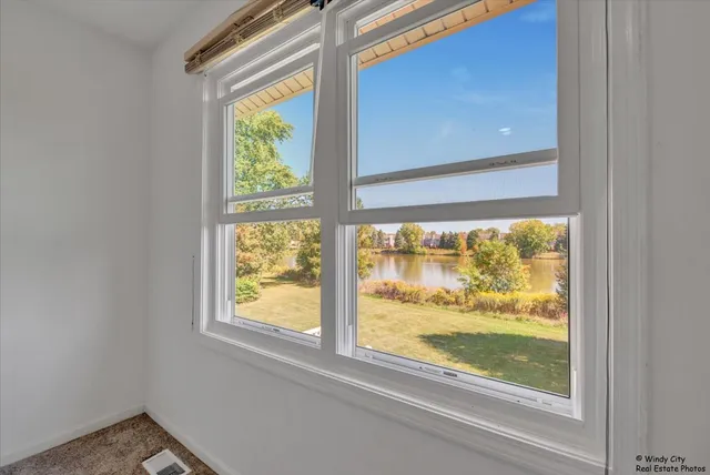 a view of a room that has a window