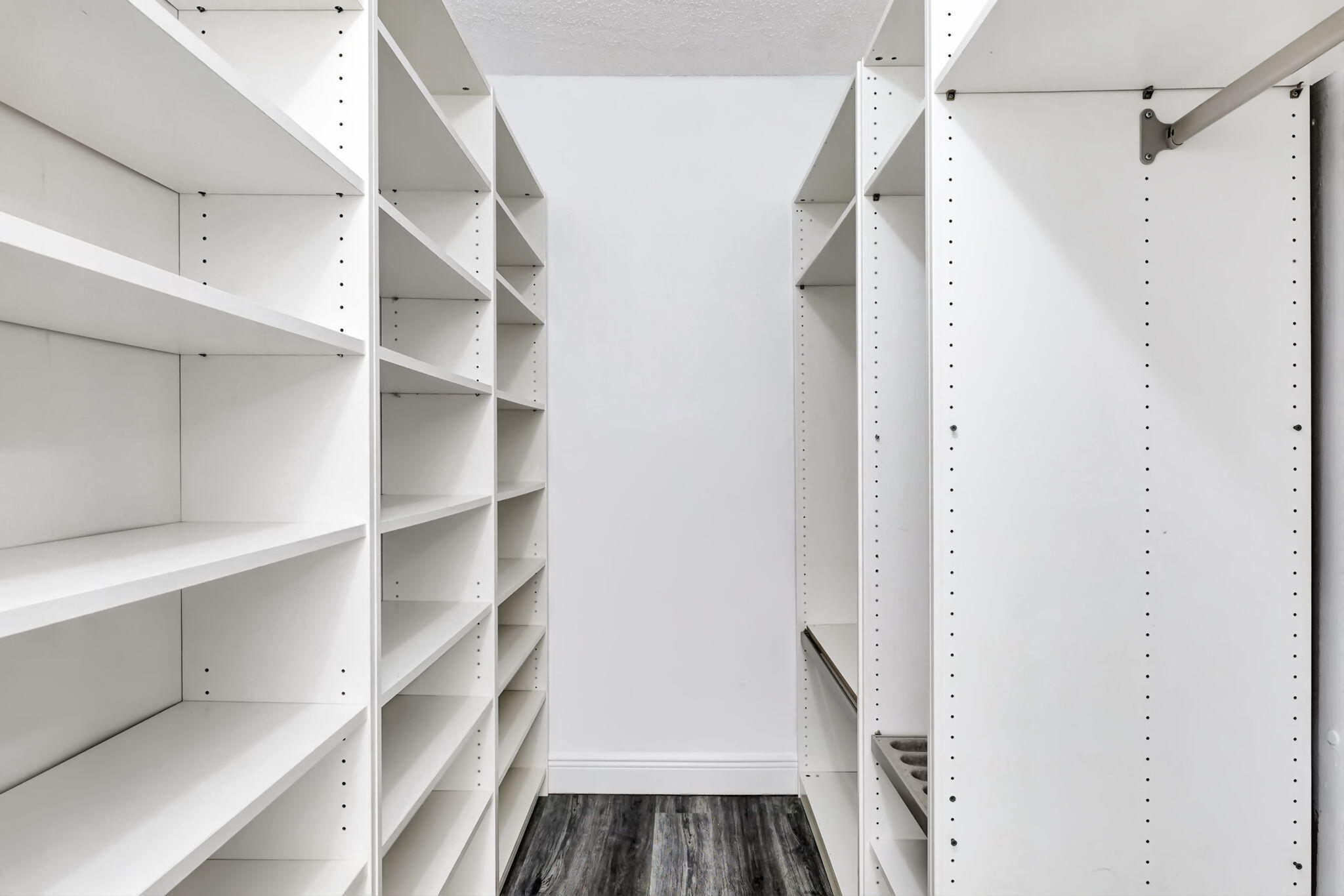 6372 Boca Circle Boca Raton, FL 33433 - Photo 16 of 34 a view of walk in closet with empty racks