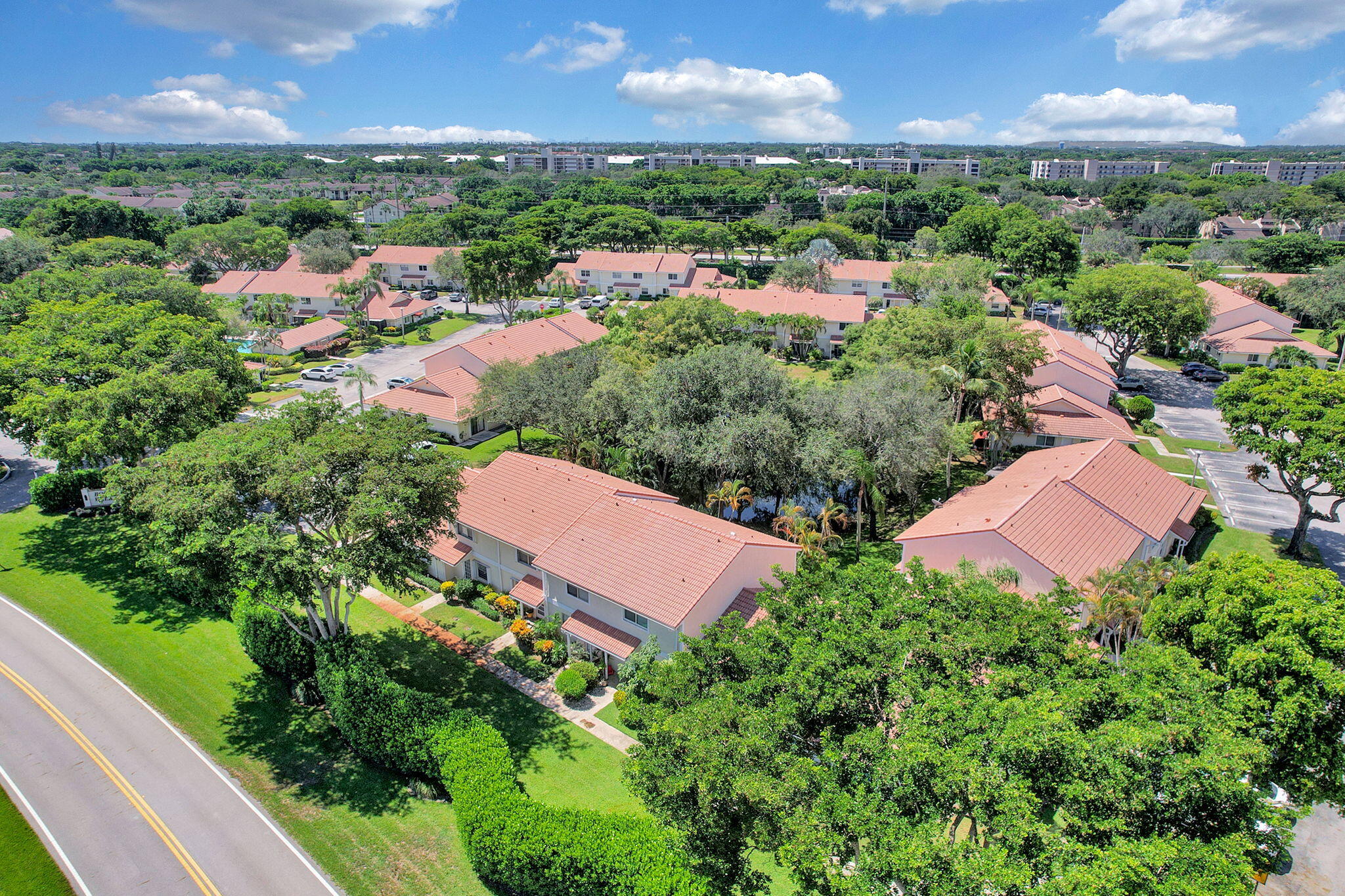 6372 Boca Circle Boca Raton, FL 33433 - Photo 26 of 34 an aerial view of a houses with a yard and lake view