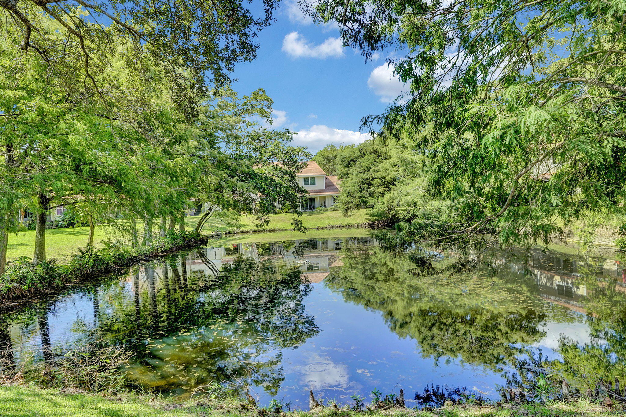 6372 Boca Circle Boca Raton, FL 33433 - Photo 33 of 34 a view of a lake with a house in background
