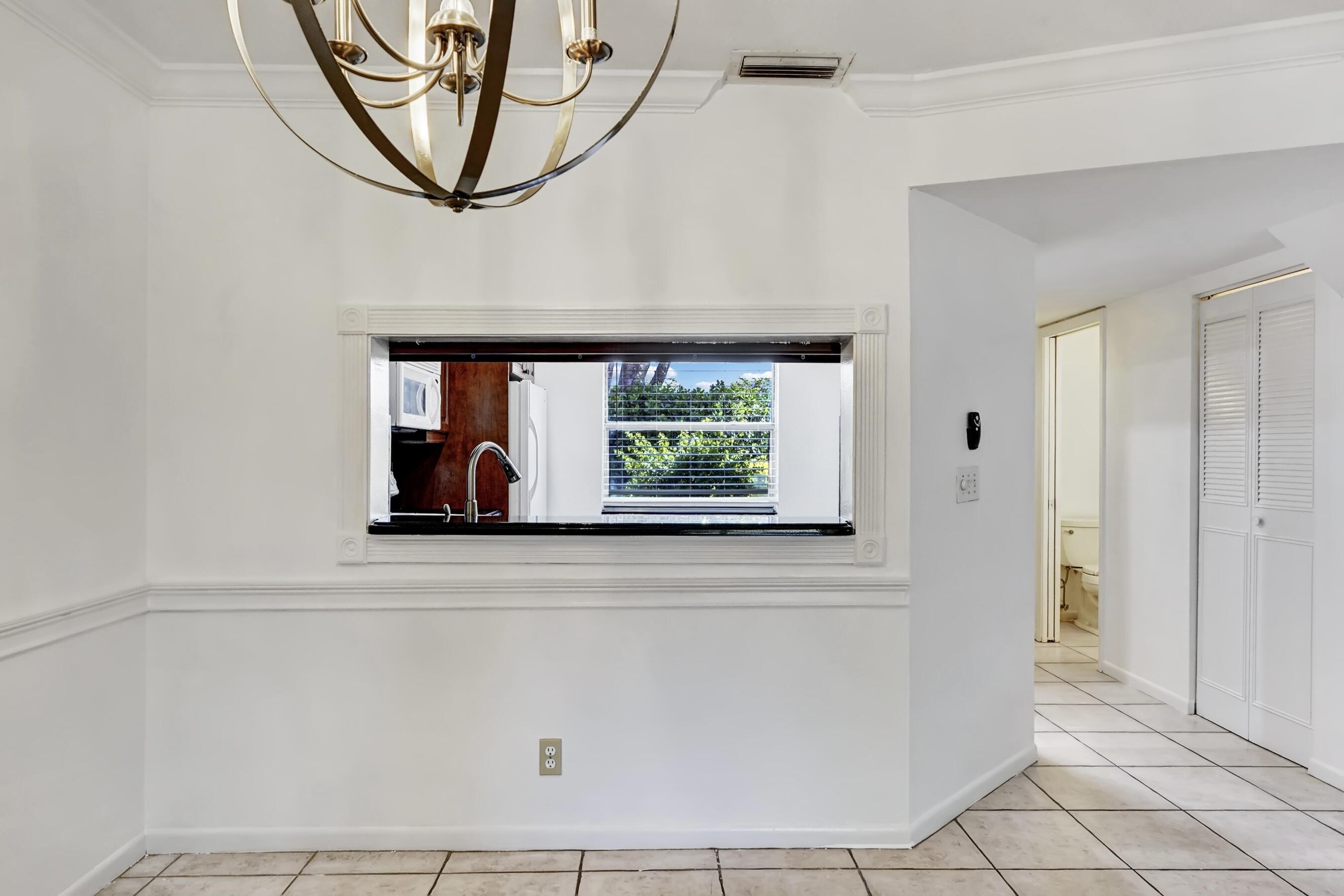 6372 Boca Circle Boca Raton, FL 33433 - Photo 9 of 34 a close up of a wall with a window