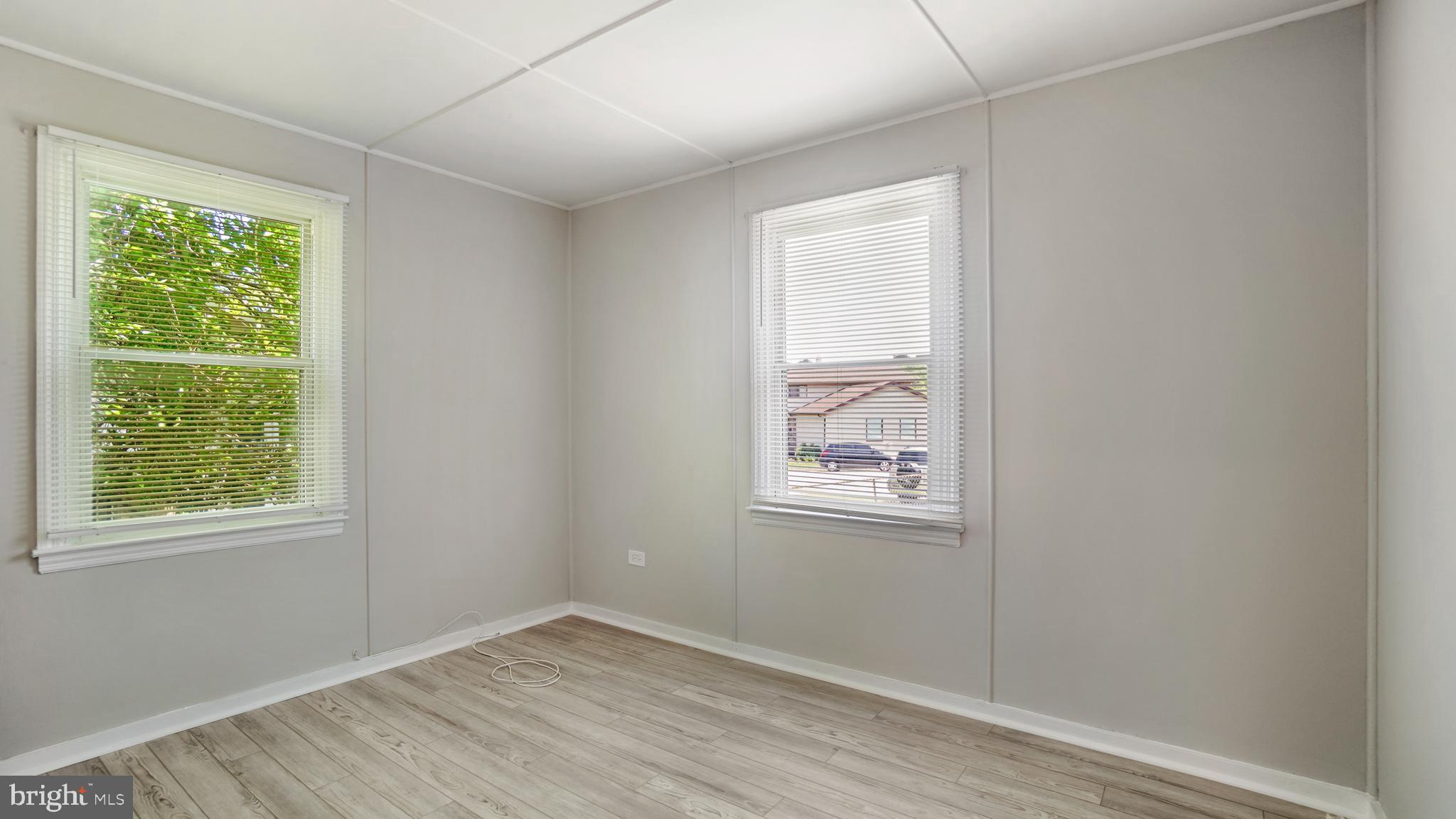 1802 Kitty Hawk Road Baltimore, MD 21221 - Photo 13 of 22 an empty room with windows