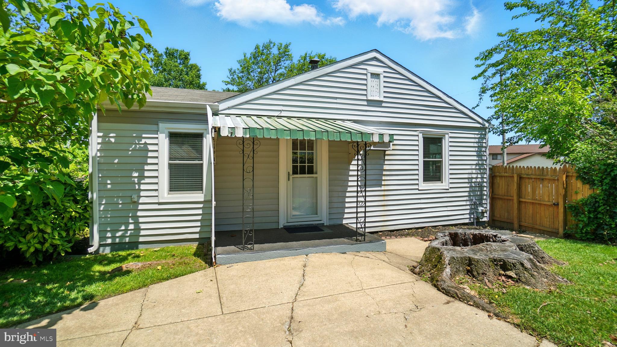 1802 Kitty Hawk Road Baltimore, MD 21221 - Photo 18 of 22 a front view of a house with a garden