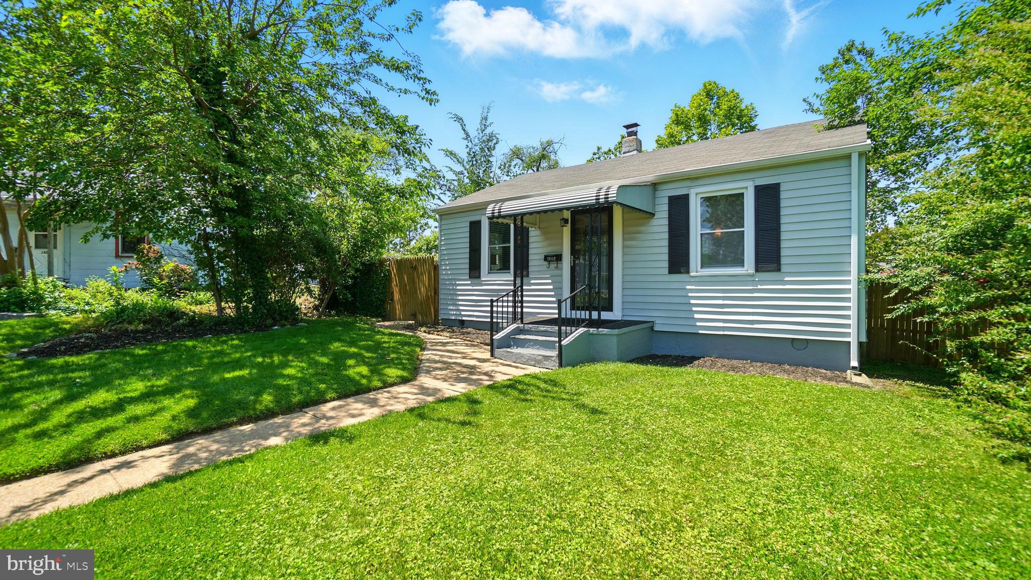 1802 Kitty Hawk Road Baltimore, MD 21221 - Photo 3 of 22 a front view of house with yard and green space