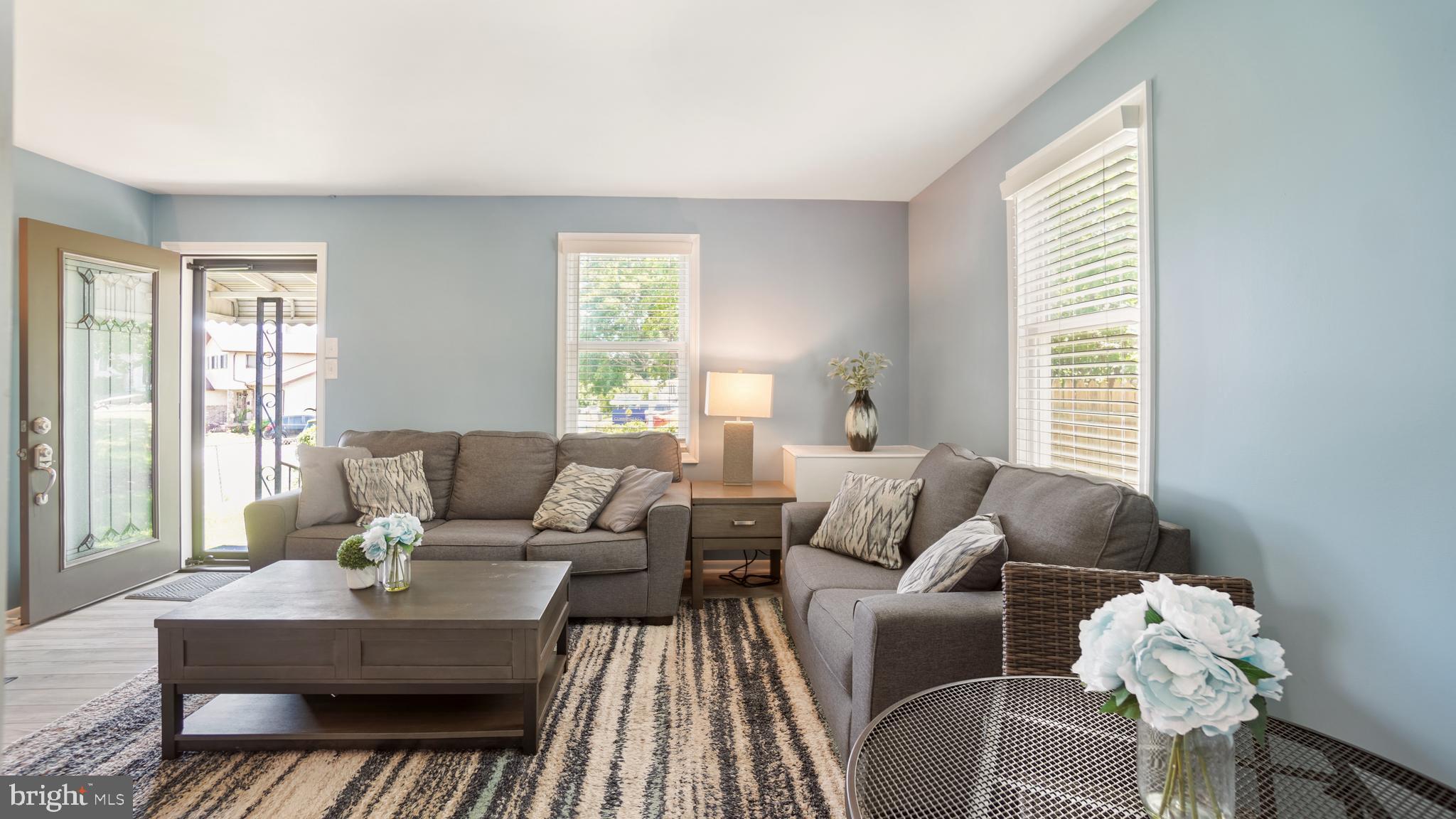 1802 Kitty Hawk Road Baltimore, MD 21221 - Photo 7 of 22 a living room with furniture and a window