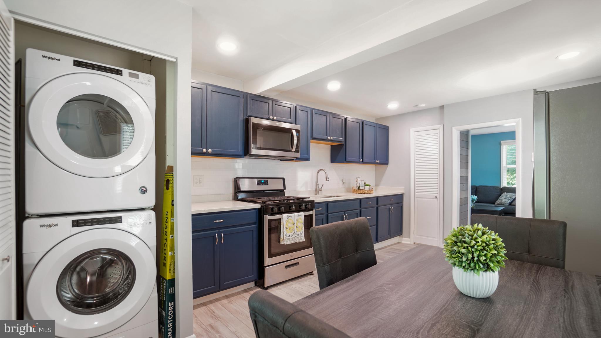 1802 Kitty Hawk Road Baltimore, MD 21221 - Photo 10 of 22 a living room with furniture and a wooden floor