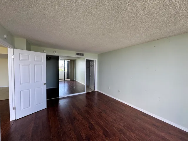 a bathroom with a sink toilet tub and shower
