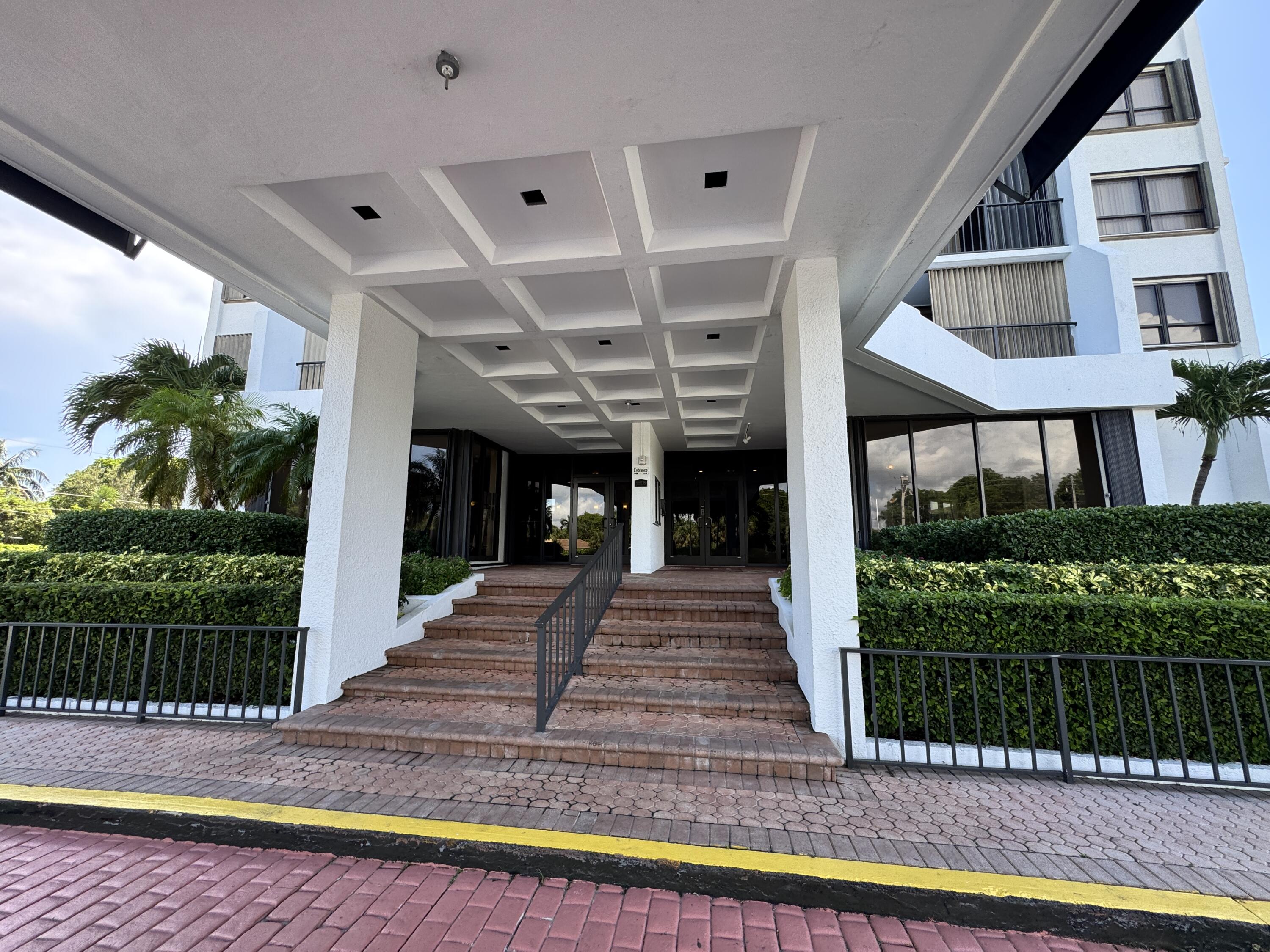 5600 North Flagler Drive, Unit 906 West Palm Beach, FL 33407 - Photo 4 of 18 a view of a house with a swimming pool