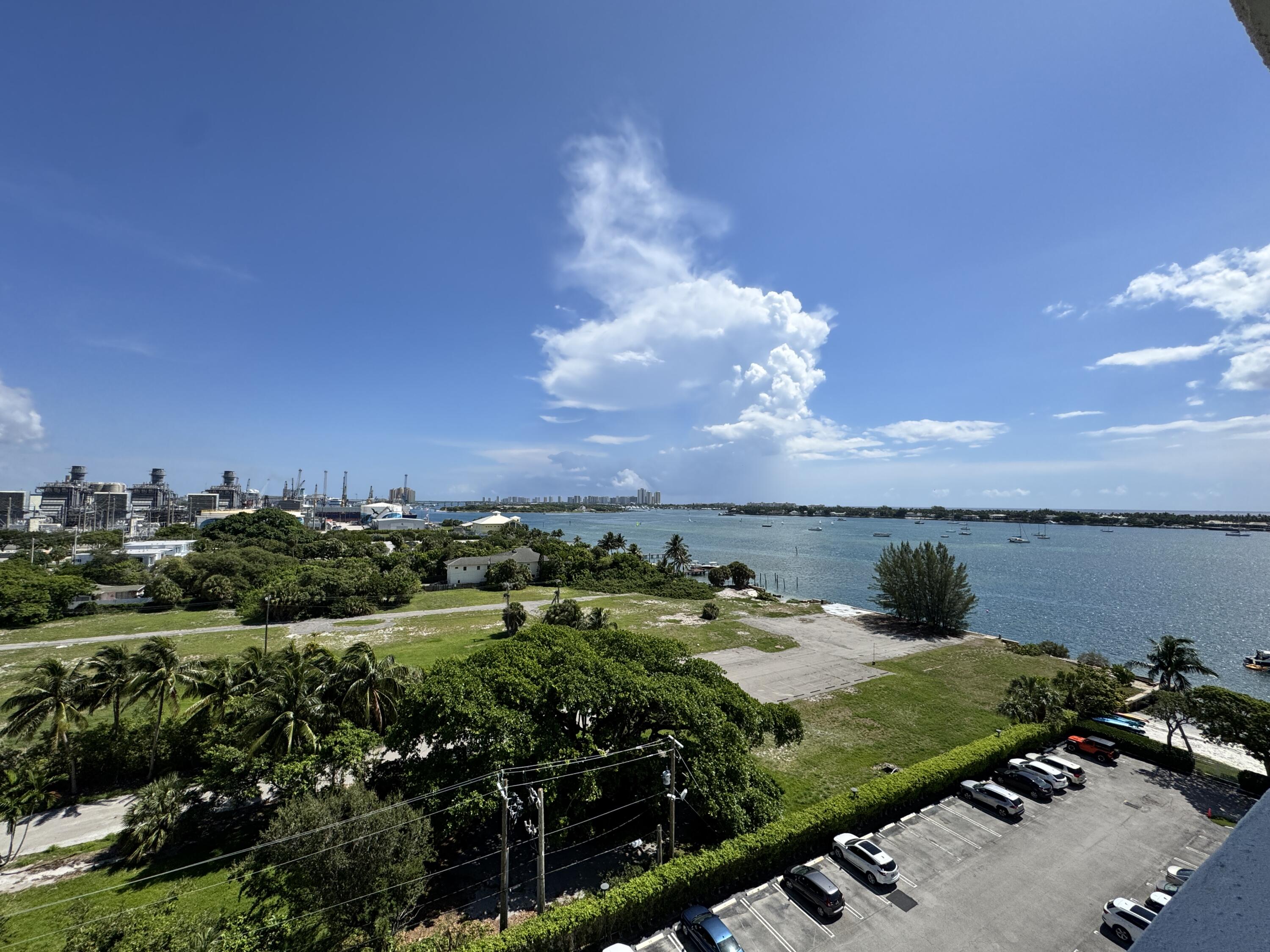 5600 North Flagler Drive, Unit 906 West Palm Beach, FL 33407 - Photo 6 of 18 a view of a lake with houses