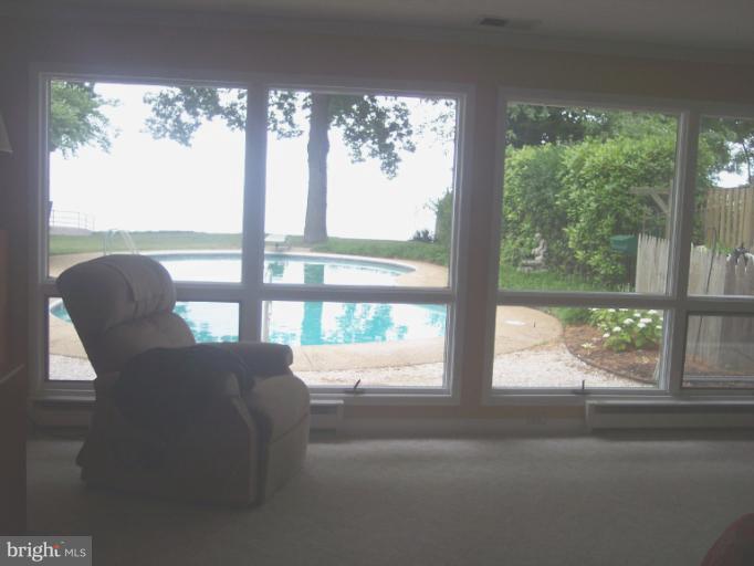 1547 Shipsview Road Annapolis, MD 21409 - Photo 8 of 28 Master sitting area takes in the pool