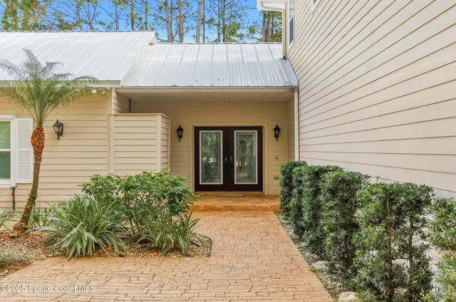 a kitchen with granite countertop a sink and a window