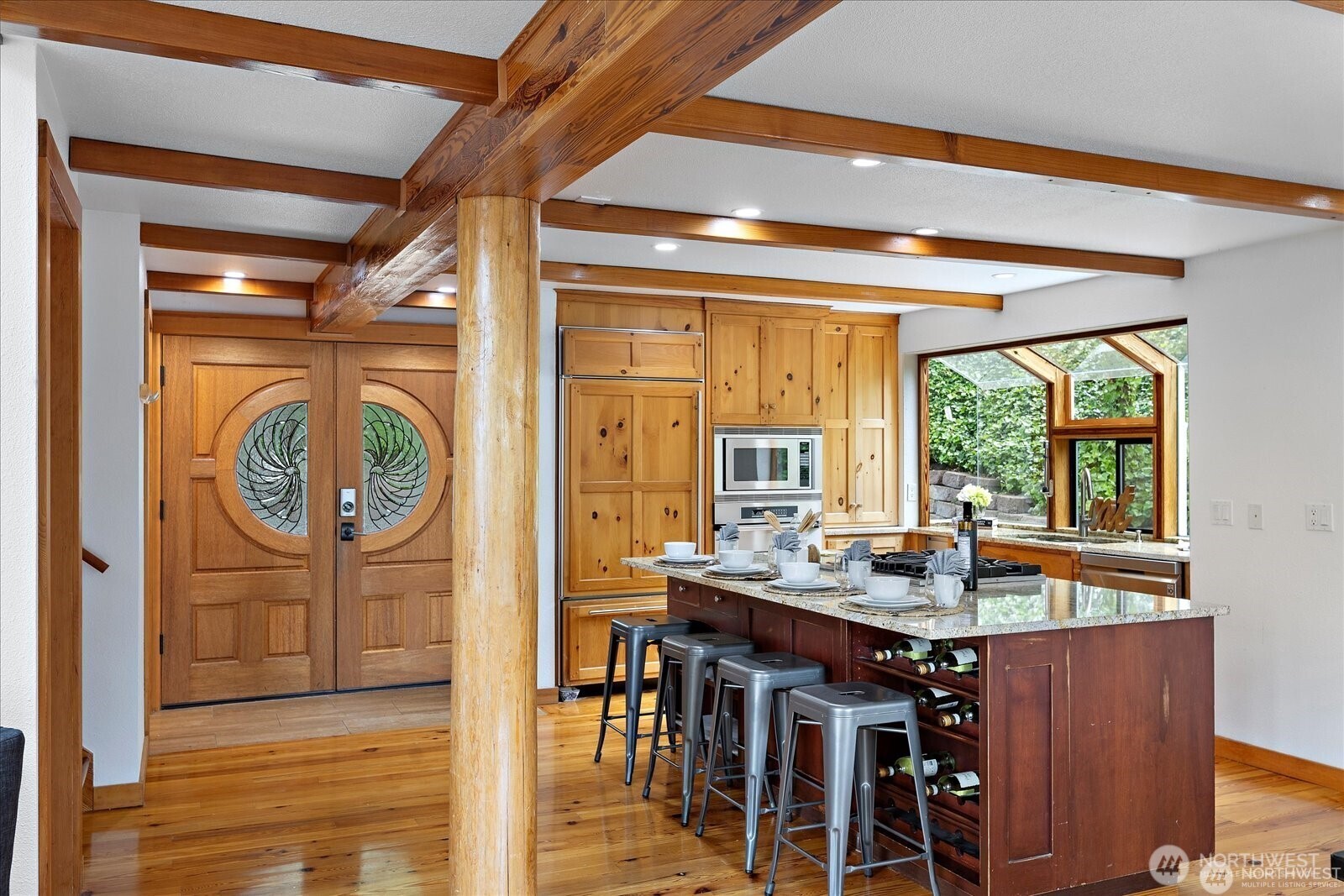 8526 East Mercer Way Mercer Island, WA 98040 - Photo 15 of 40 a dining table with chairs and window