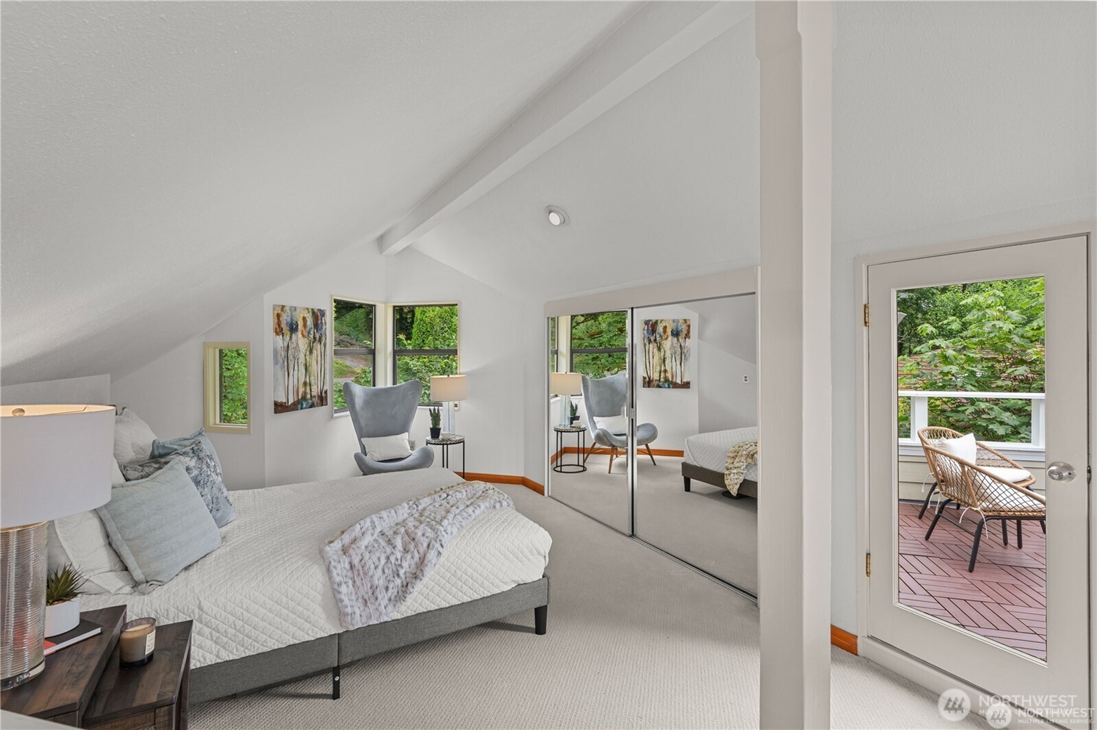 8526 East Mercer Way Mercer Island, WA 98040 - Photo 29 of 40 a living room with furniture large window and table