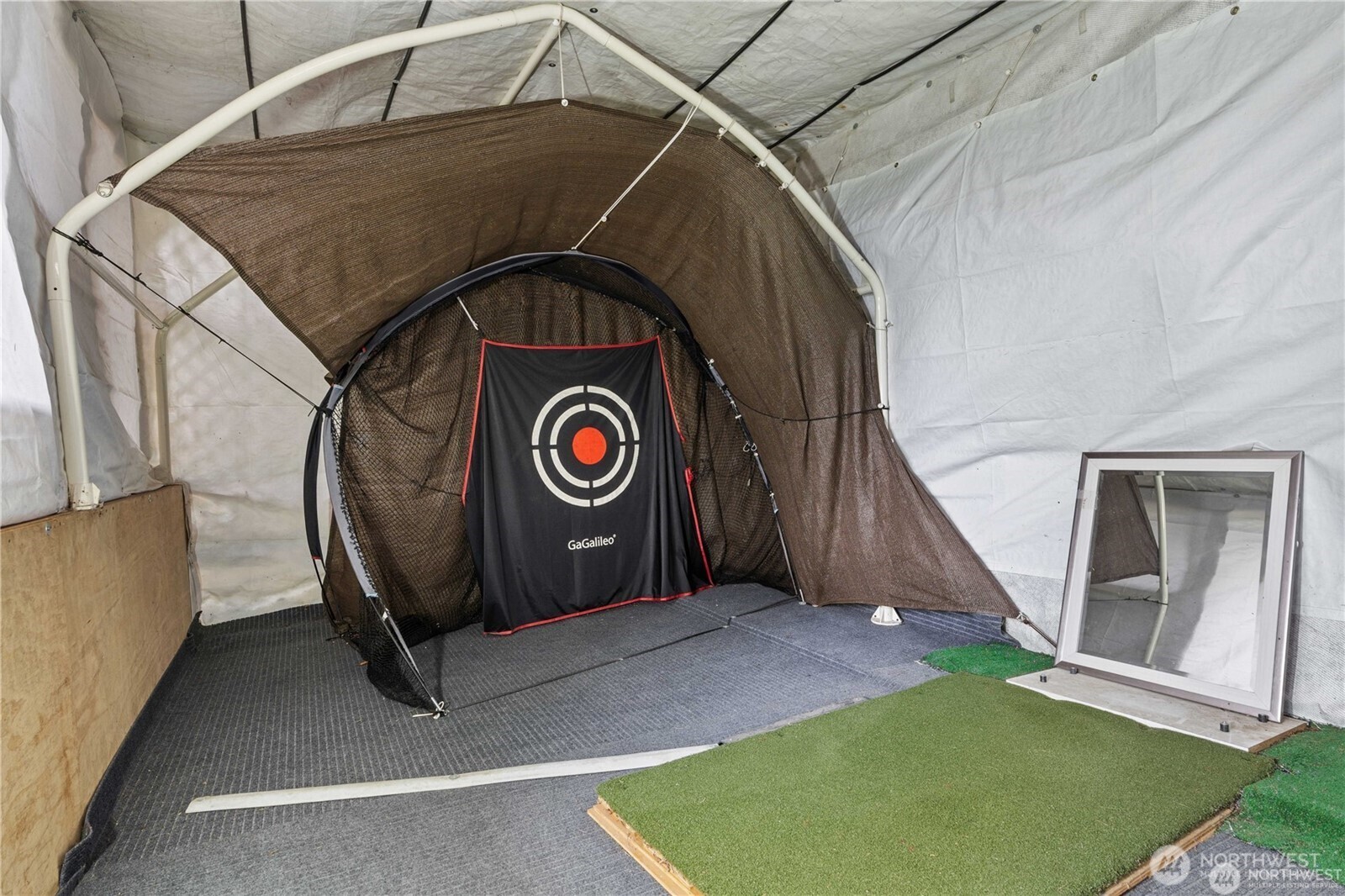8526 East Mercer Way Mercer Island, WA 98040 - Photo 37 of 40 a blue sign that is sitting on a wooden floor