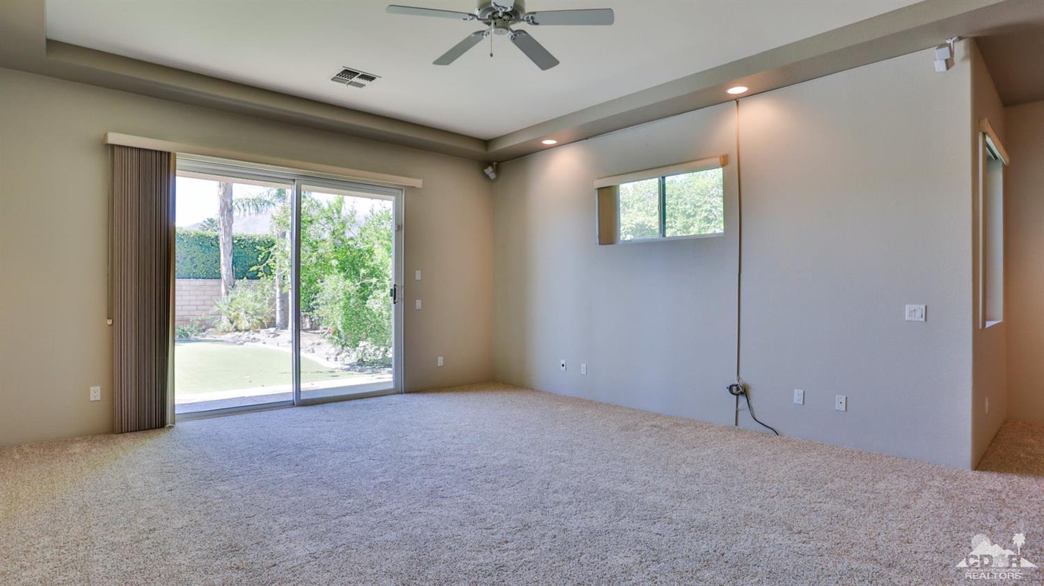 5 University Circle Rancho Mirage, CA 92270 - Photo 24 of 60 a view of an empty room with a window