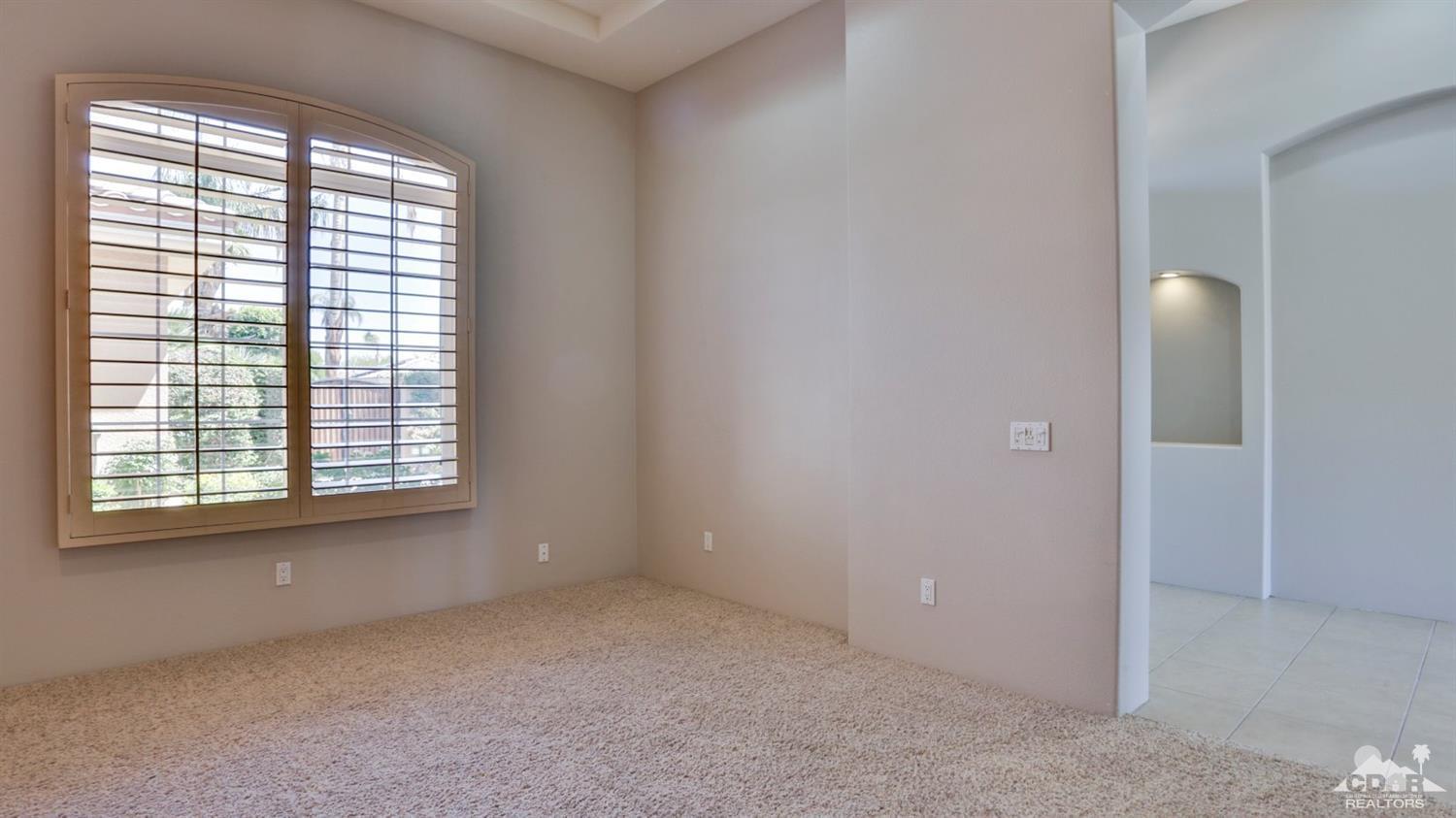5 University Circle Rancho Mirage, CA 92270 - Photo 34 of 60 a view of an empty room with a window