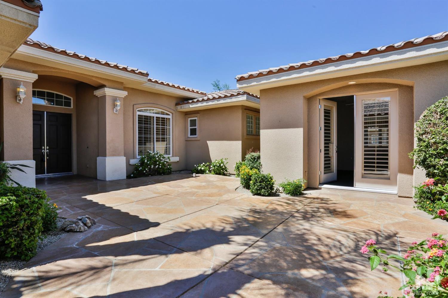 5 University Circle Rancho Mirage, CA 92270 - Photo 50 of 60 front view of a house
