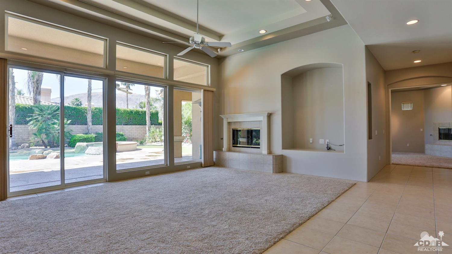 5 University Circle Rancho Mirage, CA 92270 - Photo 6 of 60 a view of empty room with floor to ceiling window