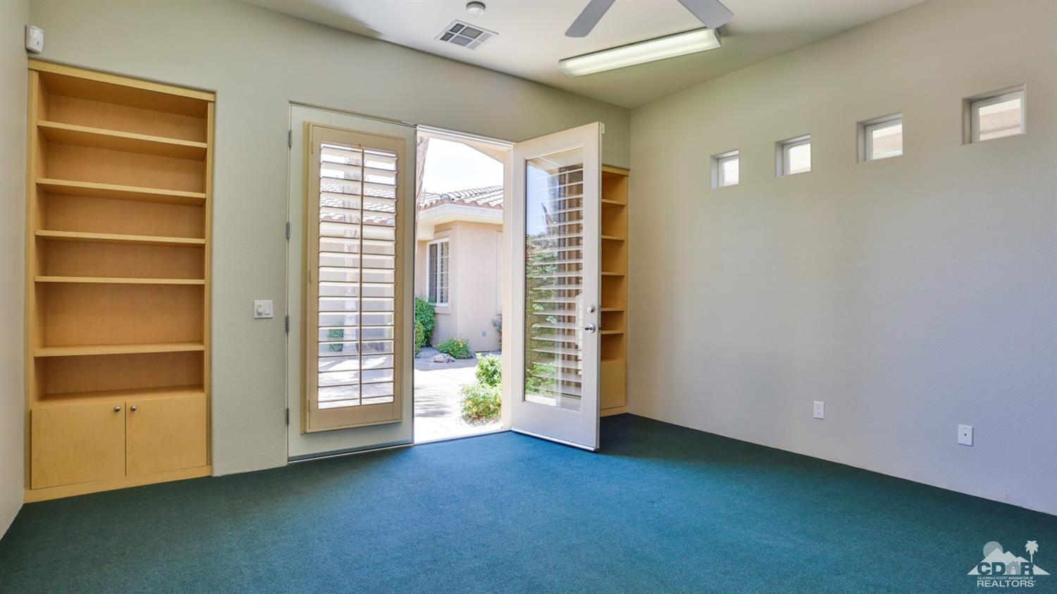 5 University Circle Rancho Mirage, CA 92270 - Photo 53 of 60 a view of an empty room with a window