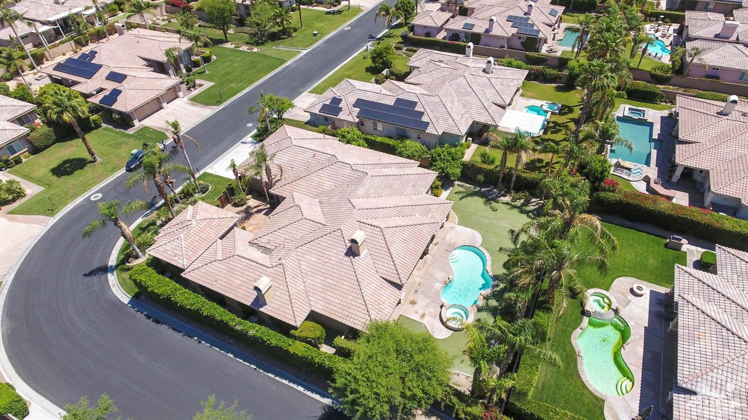 5 University Circle Rancho Mirage, CA 92270 - Photo 56 of 60 an aerial view of multiple houses with yard
