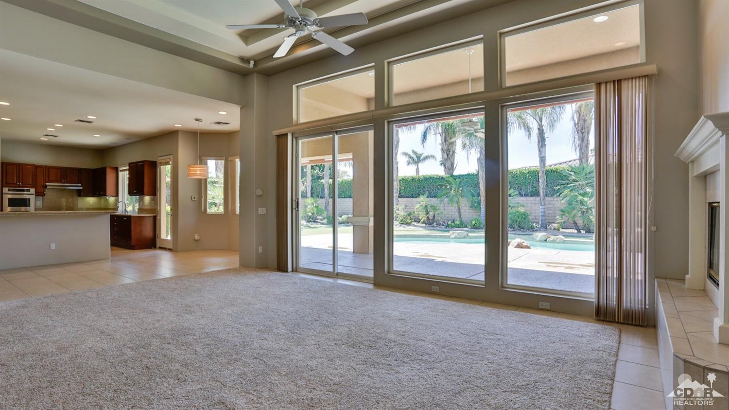 5 University Circle Rancho Mirage, CA 92270 - Photo 7 of 60 a view of an empty room with a sliding door