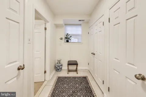 a bathroom with a shower and a toilet