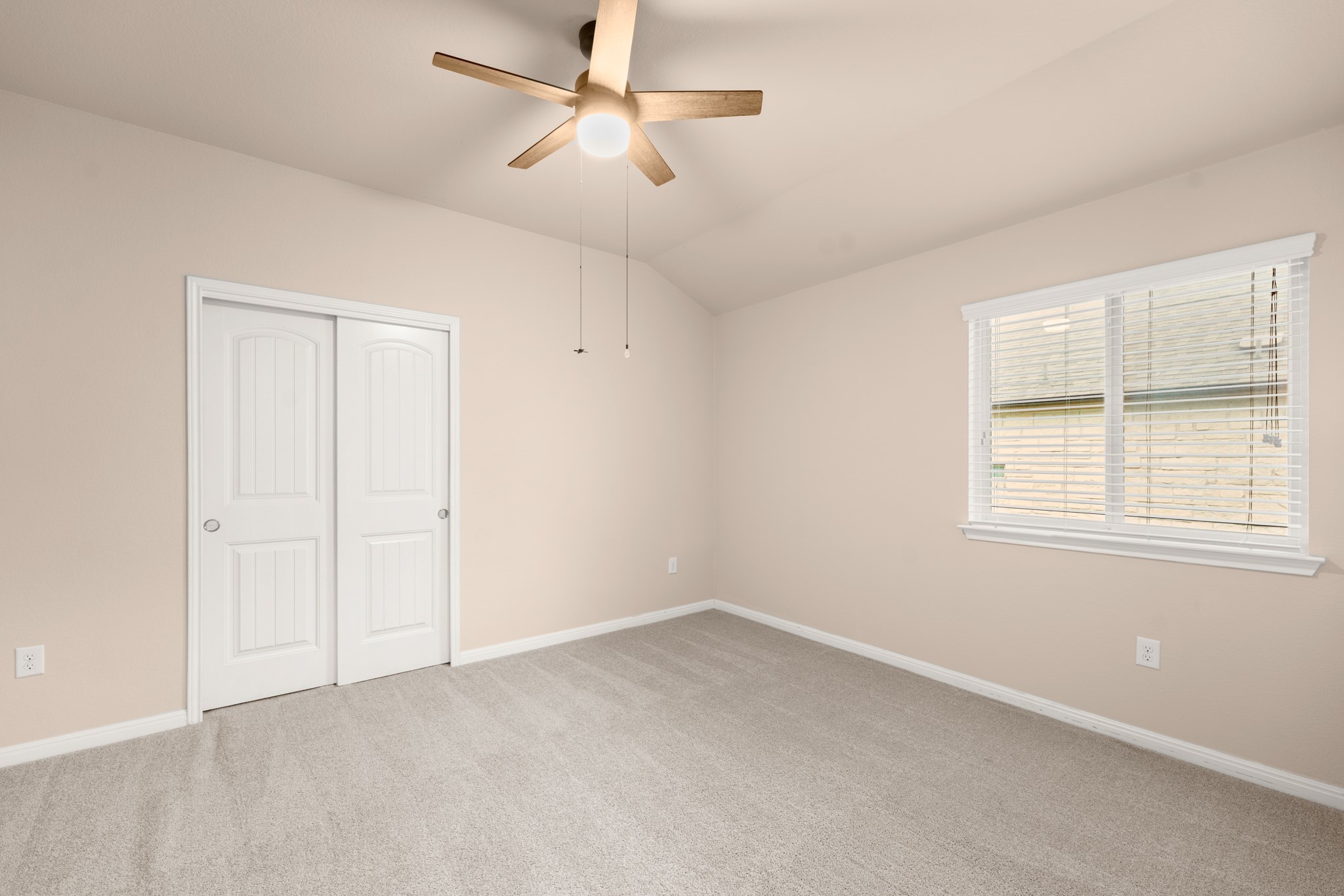305 Longhorn Cavern Road Leander, TX 78641 - Photo 13 of 21 Bedroom #2 Plenty of storage space here with these classic sliding closet doors and great natural light from the large window.
