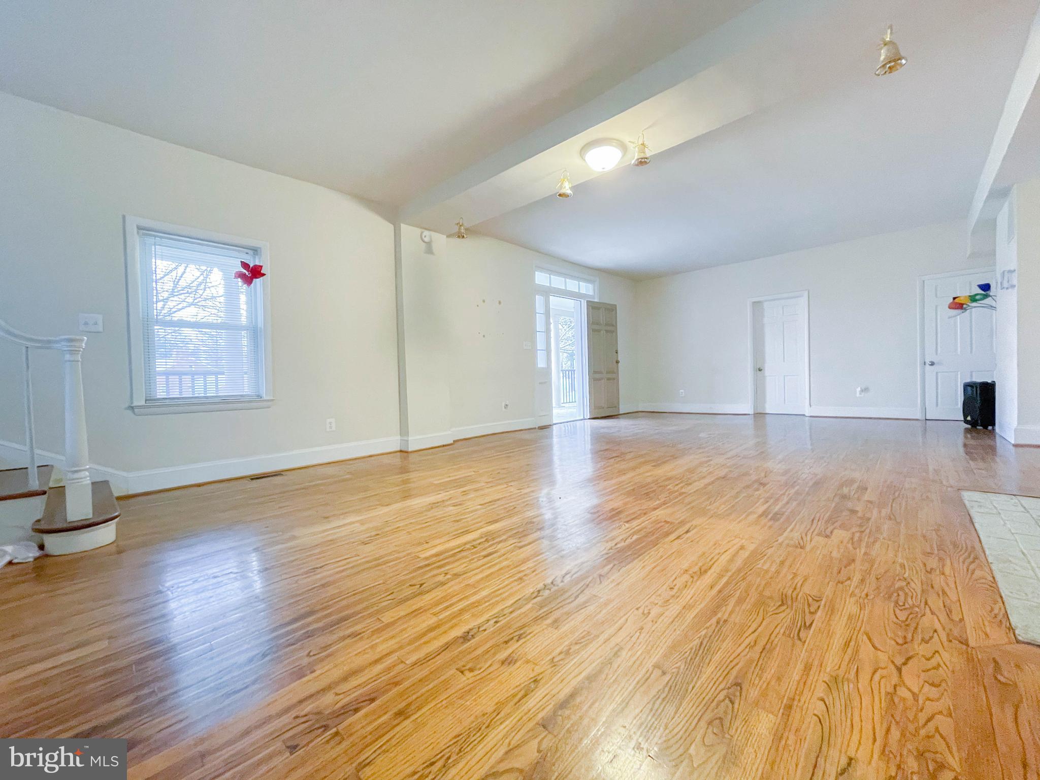 7708 Brooklyn Bridge Road Laurel, MD 20707 - Photo 23 of 23 Bright and expansive family room/living room