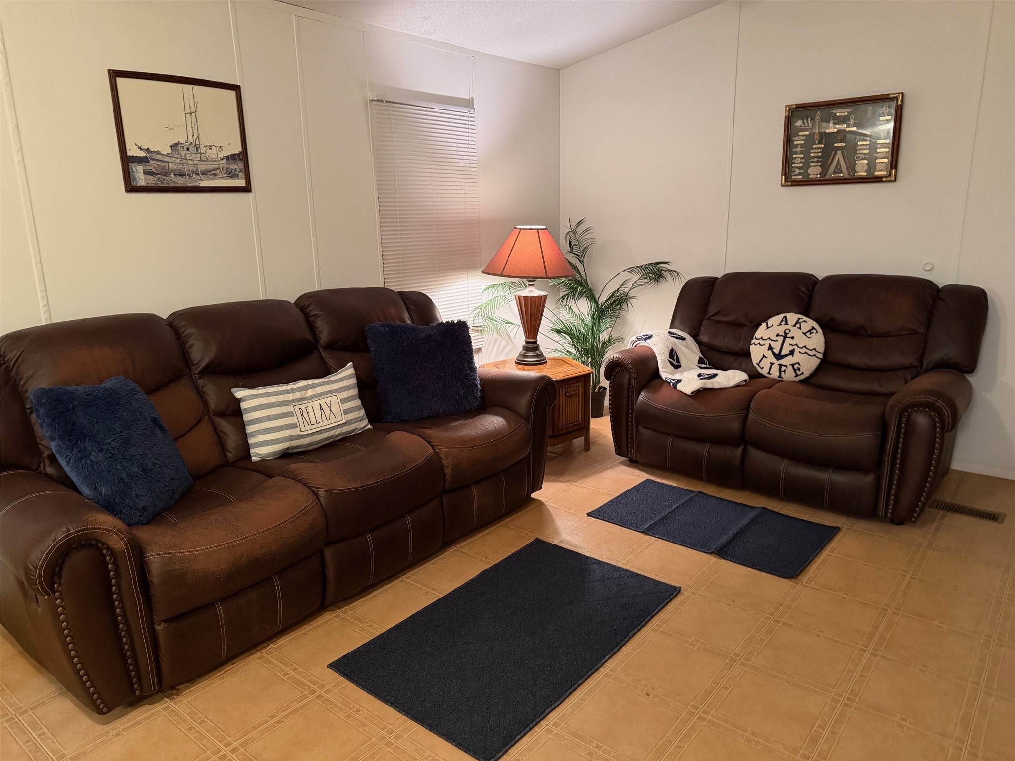 168 Rain Forest Road Onalaska, TX 77360 - Photo 8 of 25 a living room with furniture and a couch