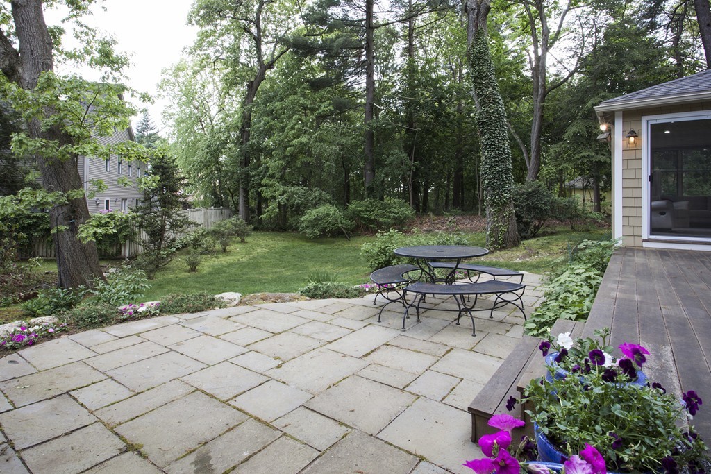 162 Waban Avenue Newton, MA 02468 - Photo 4 of 24 a view of a table and chairs in backyard of the house