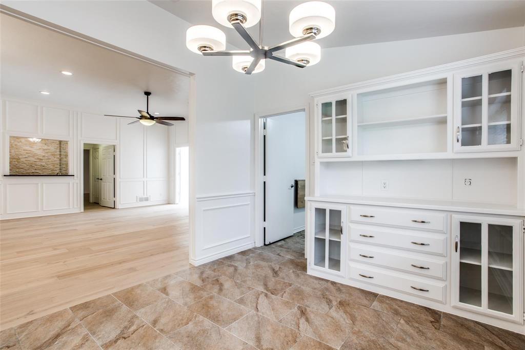 6926 Northwood Road Dallas, TX 75225 - Photo 16 of 29 a view of an empty room with a cabinet