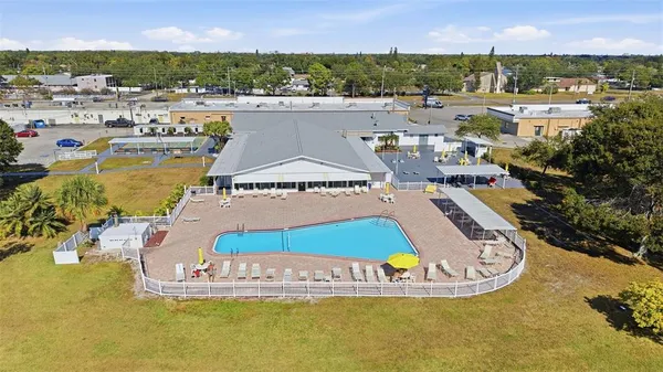 a view of a swimming pool with a lake