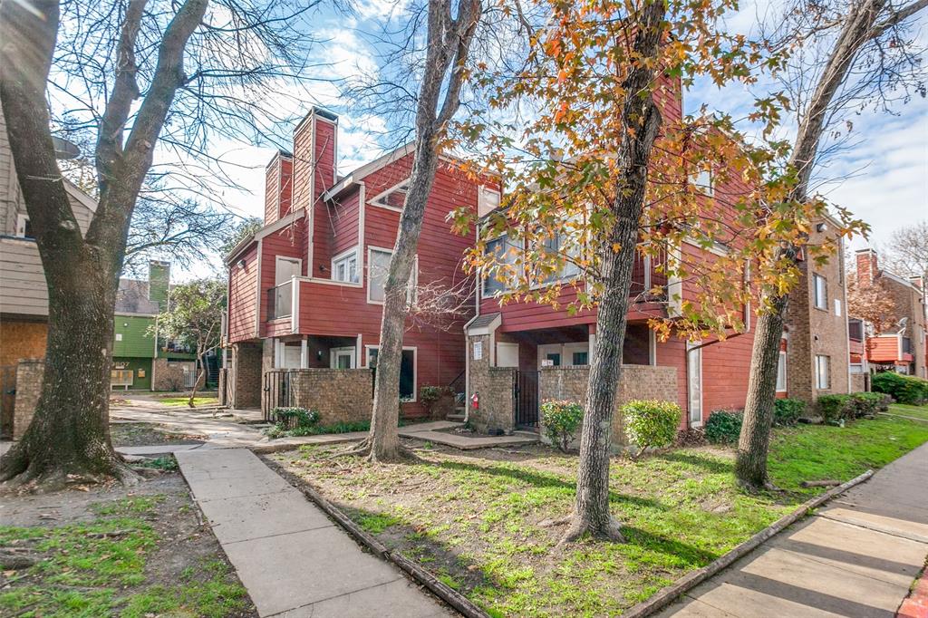 9805 Walnut Street, Unit 114 Dallas, TX 75243 - Photo 1 of 1 a front view of a house with garden