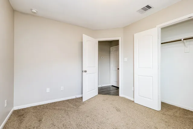 an empty room with closet