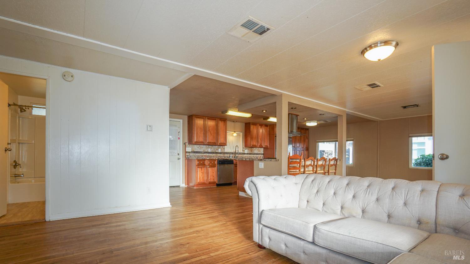 2412 Foothill Boulevard, Unit 124 Calistoga, CA 94515 - Photo 20 of 49 a living room with furniture and a fireplace