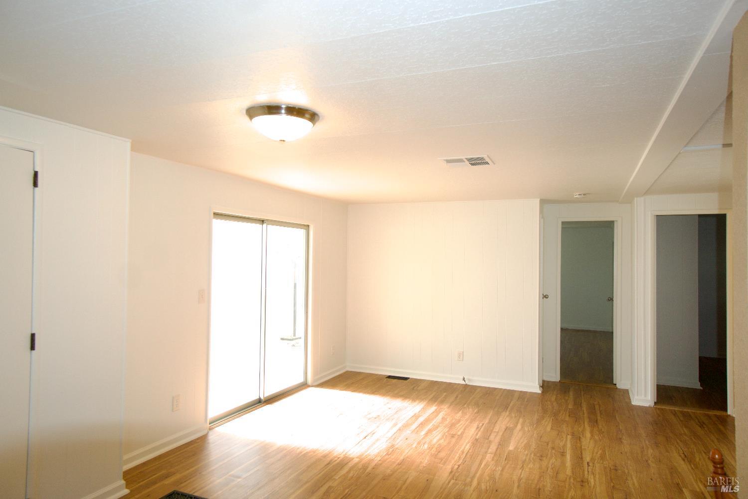 2412 Foothill Boulevard, Unit 124 Calistoga, CA 94515 - Photo 29 of 49 a view of an empty room and window